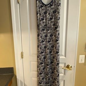 Beautiful Navy floral pattern jumpsuit with tags. Size M